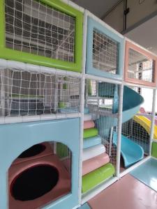 a play room with stairs and play equipment at Meandri in Nova Varoš +17 photos