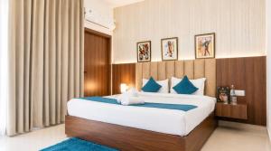 a bedroom with a bed with a stuffed animal on it at Hotel Heaven and Hills in Kasauli