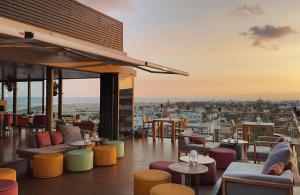 a restaurant with a view of a city at Bohemia Suites & Spa - Adults Only in Playa del Ingles