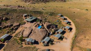 an aerial view of a small village with rocks at Soft Adventure Camp in Solitaire