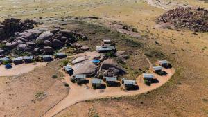 an aerial view of a small village on a hill at Soft Adventure Camp in Solitaire +29 photos
