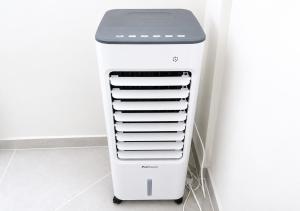 a white and black refrigerator in a room at Residência Alto Saco - Studio - Tarrafal de São Nicolau in Tarrafal +8 photos