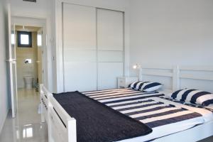 Posteľ alebo postele v izbe v ubytovaní Infinity View by Mar Holidays - Arenales del Sol