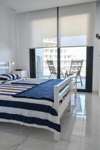 Posteľ alebo postele v izbe v ubytovaní Infinity View by Mar Holidays - Arenales del Sol