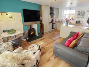 a living room with a couch and a table at 4 Eve Street in Louth
