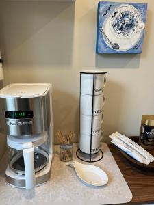 a coffee maker sitting on top of a counter at Tobermory Tides bed and breakfast in Tobermory