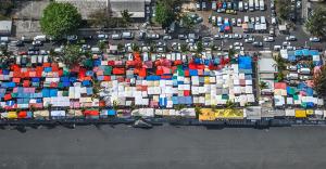 an aerial view of a parking lot with cars at Coeur SAINT-PAUL in Saint-Paul