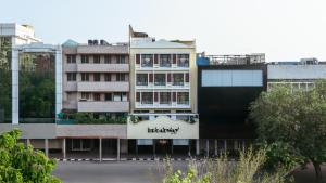 a building with a sign on the side of it at Broadway An Alivaa Collection Hotel, near Connaught Place in New Delhi