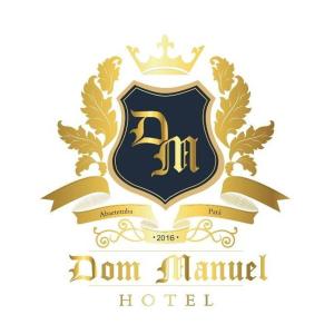 a crest with a royal crest and a banner at Dom Manuel Hotel in Abaetetuba