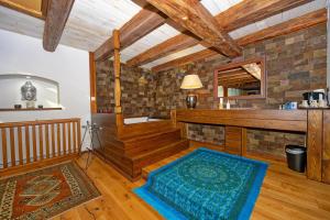 a living room with a rug on the floor at Zalanka in Zalaköveskút +32 photos