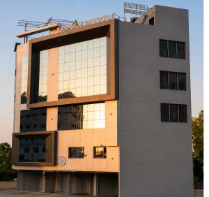 a building with a lot of windows at The Bhavani Hotel in Dāhod