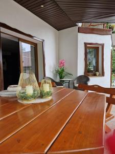 a wooden table with two lamps on top of it at Bylew Zacisze in Licheń Stary +54 photos