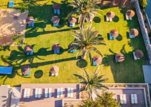 an overhead view of a yard with palm trees at Marilena Hotel in Amoudara Herakliou