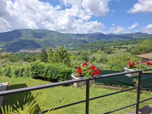 a balcony with a view of mountains at Oasi della Calvana in Vaiano