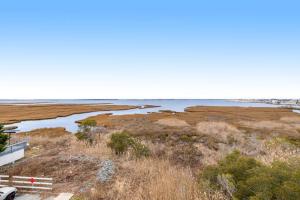 a view of a body of water with a car at Playa Flamingo #302 in Ocean City