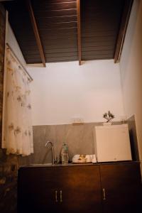 a kitchen with a sink and a counter top at Ranketha Hideout Resorts in Kurunegala +48 photos