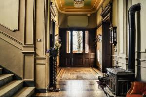 a hallway with a door in a building at Villa Guelpa in Lessona