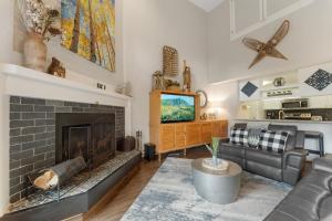 a living room with a fireplace and a tv at Pines #2041 : 2 in Keystone +42 photos