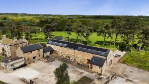 an aerial view of an old brick building at Ploughman's Rigg in Harrogate