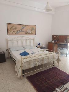 a bedroom with a large bed in a room at Mare Blu' in Crotone