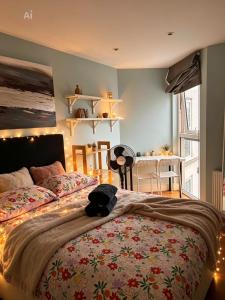 Säng eller sängar i ett rum på Splendid Euston flat