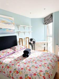 Säng eller sängar i ett rum på Splendid Euston flat +3 foton