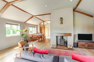 a living room with a couch and a fireplace at 2 Bed in Devizes oc-t43754 in Bulkington