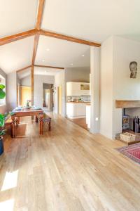 an empty living room with a table and a fireplace at 2 Bed in Devizes oc-t43754 in Bulkington