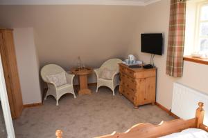 TV a/nebo společenská místnost v ubytování Lochview Guesthouse + 21 fotografií