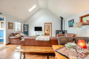 a living room with a couch and a table at 2 Bed in St. Fillans oc-a40242 in Saint Fillans