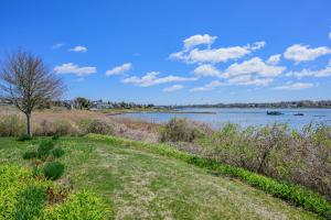 a path next to a body of water at Kelley Lane - CHT- KL161 in Chatham