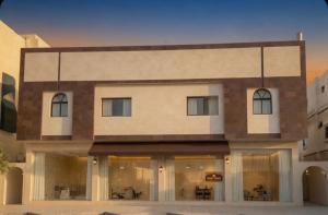 a rendering of the front of a building at Bluestone Amlak 1 in Medina