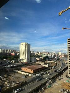 a view of a city with a highway and buildings at Newly built Modern 2 BR apartment in Ulaanbaatar