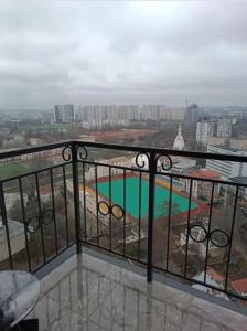a balcony with a view of a swimming pool at ЖК Акрополь, Парк Перемоги, Аркадія in Odesa