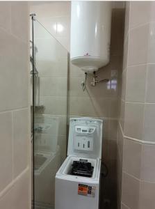 a small kitchen with a stove and a sink at ЖК Акрополь, Парк Перемоги, Аркадія in Odesa