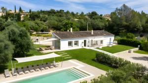 an aerial view of a house with a swimming pool at Can Soto in Palma de Mallorca