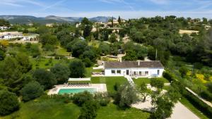 an aerial view of a house with a swimming pool at Can Soto in Palma de Mallorca
