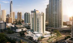 an aerial view of a city with tall buildings at voco Gold Coast by IHG in Gold Coast