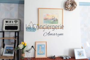 a collage of pictures on a white wall with aocaccociate amazon at Le Maluthina Maison Familiale au Hourdel entre Mer & Nature in Cayeux-sur-Mer