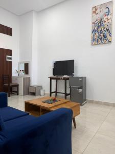 Haussmann Hôtel tesisinde bir televizyon ve/veya eğlence merkezi