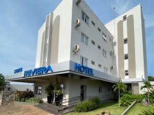 eine Darstellung des Riviera Hotels in der Unterkunft Hotel Riviera Lins in Lins