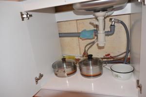 a kitchen counter with two pots and a mixer at Holiday Home near sea in Odesa +42 photos