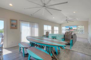 a dining room with a table and chairs at Dock Holiday in Greenbackville