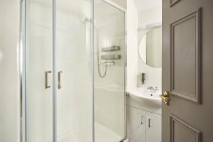 a bathroom with a shower and a sink at Inn at Port nan Gael in Pennyghael +36 photos
