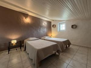 a hospital room with two beds and a window at Axuri-alde in Sare