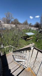 a set of stairs leading to a park with a picnic table at sweet home in Sevan