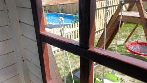a view from a window of a playground at Chyba Wyspa, Ostrowo in Ostrowo +24 photos