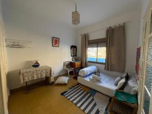 a living room with a couch and a table at Studio coeur tanger in Tangier