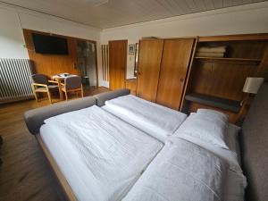 a bedroom with a bed with two white pillows at Appartement Maria Leiter in Sillian