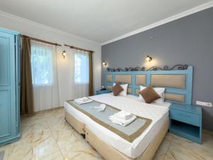 Postel nebo postele na pokoji v ubytování Hotel Atrium + 190 fotografií